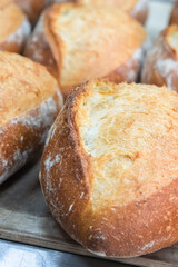 Craft bread on the table at the bakery. The concept of small industries and healthy food