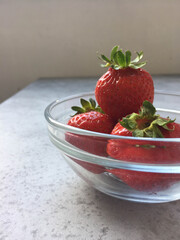 strawberries in a glass bowl