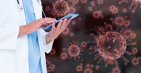 Digital illustration of a doctor using a digital tablet over macro Coronavirus Covid-19 cells floati