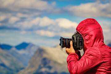Tourist taking photo from Dalsnibba mountain, Norway
