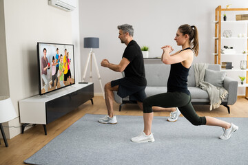Fototapeta na wymiar Online TV Home Fitness Workout