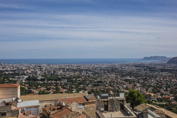 Obraz premium Aerial view of Monreale city from Cathedral of Monreale. Monreale - town and commune in the Metropolitan City of Palermo. Sicily, Italy, Europe.