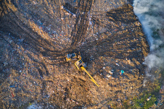 Aerial view of two cranes operating in west dumping area near Chittagong township, Bangladesh.