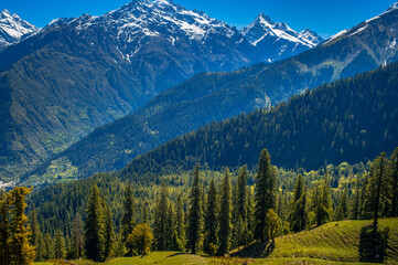 Panorama of the mountains in autumn. Landscape in the mountains. View of Majestic Himalayan mountains in Parvati Valley, Himachal Pradesh, 
India.