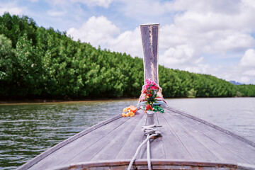 Bow of traditional thai wooden longtail boat.