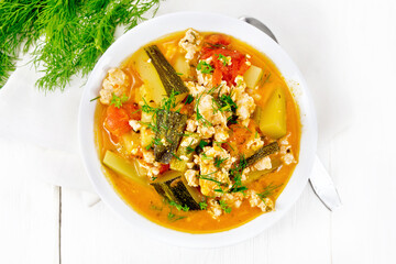 Ragout of zucchini and minced meat in plate on board top