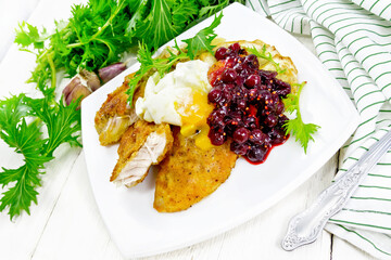 Turkey breast with cranberry sauce on table