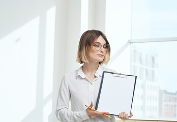 room finance woman business documents interior window