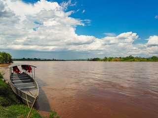 Views of the beautiful huallaga river with boats in San Martin, Peru