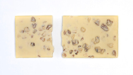 sweet and delicious whole chocolate bar is lying on white background, photo taken from above