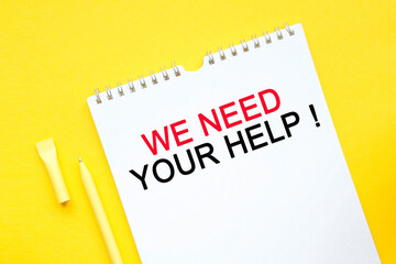 WE NEED YOUR HELP inscription on white list, yellow pen on a yellow background. a bright solution for business, financial, marketing concept