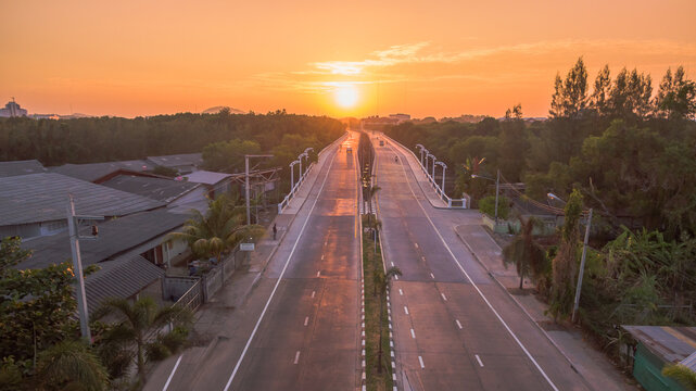 The Sun Rises Over Thepsrisin Bridge. Thepsrisin Bridge Is A Shortcut To Connect The City From Saphan Hin Intersection With Sakdidet Intersection In Order To Reduce The Bad Traffic Congestion..