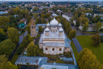 Ancient Znamensky Cathedral in the cityscape on a rainy September morning (shot from a quadcopter). Veliky Novgorod, Russia