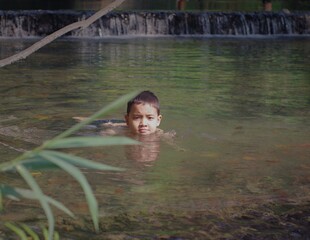 child in the hot spring