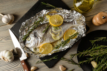 Dorado fish baked with lemon, close-up.