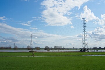Electricity lines over the river Rhine near Wageningen in the Netherlands