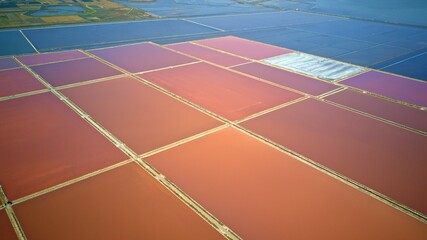 Beautiful natural scenery: red salt pans in Saline Margherita di Savoia, Italy