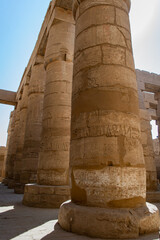 KARNAK TEMPLE - Massive columns inside beautiful Egyptian landmark with hieroglyphics, and ancient...