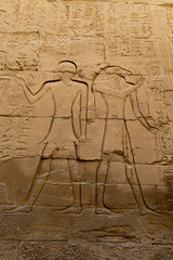 KARNAK TEMPLE - Massive columns inside beautiful Egyptian landmark with hieroglyphics, and ancient...