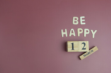 Day 12 of March month, Wooden calendar with date. Empty space for text.