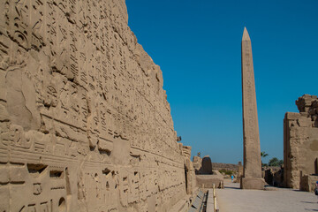 KARNAK TEMPLE - Massive columns inside beautiful Egyptian landmark with hieroglyphics, and ancient...