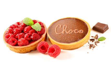 chocolate cake and raspberry tart isolated on white background