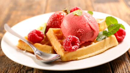 waffle with ice cream and raspberry
