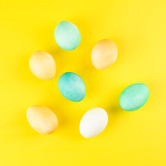 Easter eggs on an yellow background. copy space
