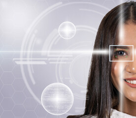 Eye scanning of asian young woman by laser light over the digital virtual technology background, vision and identification concept