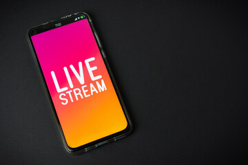 Phone with Live stream logo on black background