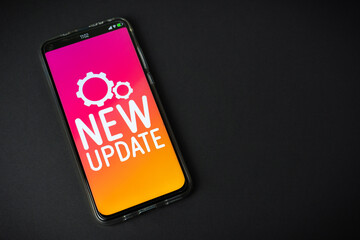 New update - Phone on black background