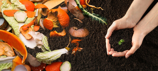 Organic waste for composting on soil and woman holding green seedling, top view. Natural fertilizer - obrazy, fototapety, plakaty