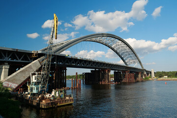 Construction of a new big bridge over a Dnieper river in Kyiv, Ukraine