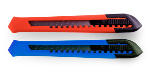 Blue and red paper cutters with closed blade