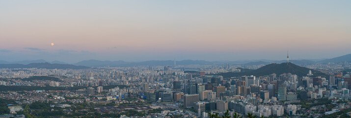 Fototapeta premium Seoul Sunset over the City in South Korea. Show Gyeongbokgung Palace, Namsan Tower at sunset.