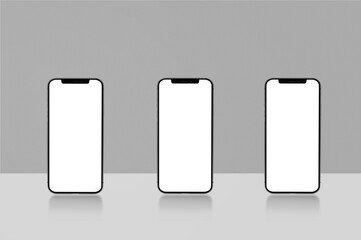 three blank mobile mockups with reflection
