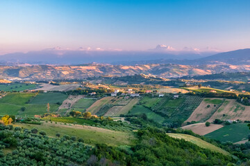Fototapeta premium Beautiful sunset on the countryside of Marche in a summer evening