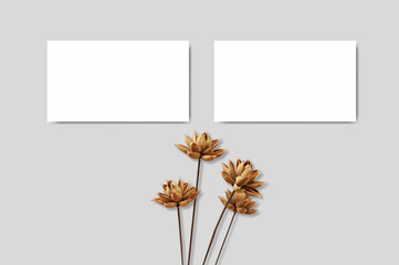 Obraz premium business card mockup with dry flowers