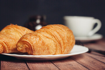 croissants plates on wooden table kitchen breakfast fresh smell