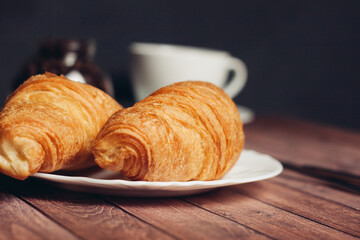 fresh croissants on the table breakfast for dessert close-up