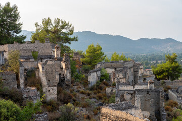 Fototapeta na wymiar Kayaköy (Levissi Village), which was abandoned by the Greeks during the population exchange long ago. Kayakoy, Fethiye, Mugla, Turkey