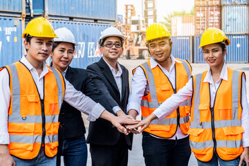 Group of employees and management team wearing logistic uniforms for exporting products abroad,...