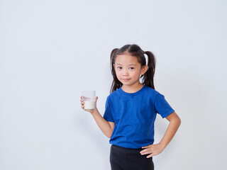 Little girl with glass of milk