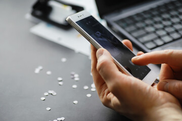 Working time symbolizes the desktop. Office desk with papers from an insurance manager and banker. Office worker at the table. The concept of lack of time.
