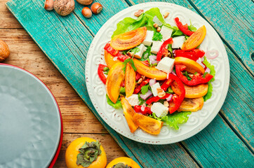 Salad with persimmon