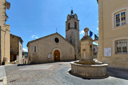 Saint Pierre les Ormeaux church and fountain of Greoux-les-Bains, a commune in the Alpes-de-Haute-Provence department in southeastern France 