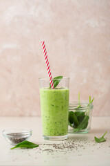 Vegetarian  green smoothie  avocado, spinach leaves and chia seeds . Healthy concept. Selective focus