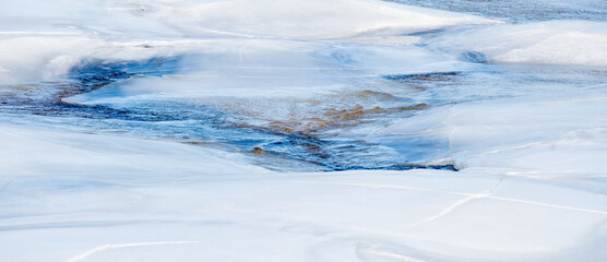 Obraz premium Frozen ice on the river texture. Abstract ice background.