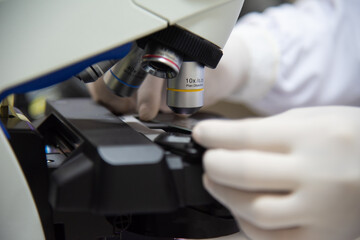 MIcroscope in laboratory with blur  background.