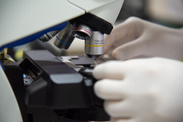MIcroscope in laboratory with blur  background.